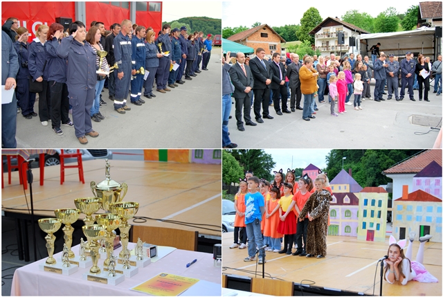 Člani in članice PGD, gostje, pokali in učenci OŠ Podčetrtek